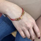 RED THREADS BRACELET