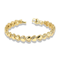 Gold heart bracelet with continuous zirconia wave