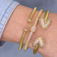 Pavé bangle bracelet with center ring detail