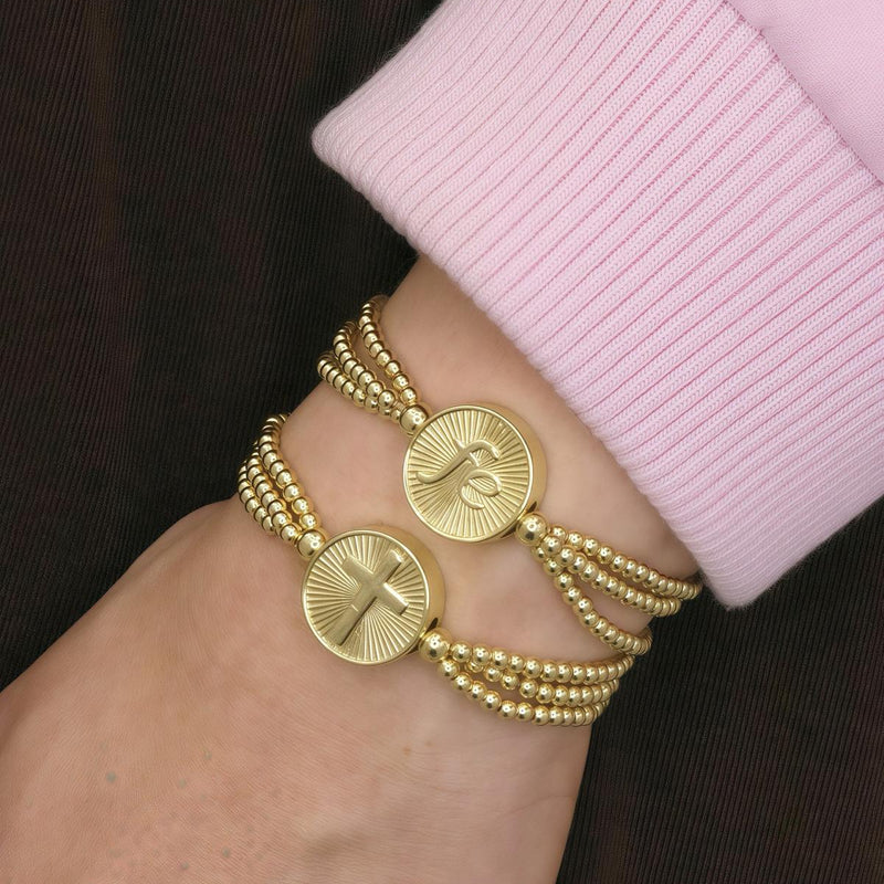 Slide bracelet with bead strands and religious medals faith & cross